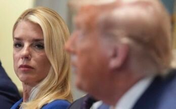 The Attorney General Pam Bondi, on the left, listens to President Donald Trump, on the right, speaks at a meeting of the cabinet at the White House.