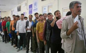 The Afghan refugees who returned after having fled Iran to escape expulsion and conflicts aligned themselves in an HCR establishment near the passage of Islam Qala in the west of the province of Herat, in Afghanistan, Friday, June 20, 2025.